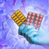 Hand,With,Vitamins.,Probiotic,Medicines.,Blisters,With,Pills,In,Doctors