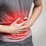 Sick,Man,Holding,Stomach,,Suffering,From,Pain,,Diarrhea,,Indigestion,Problem